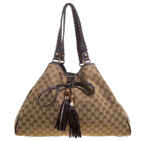 gucci braided bag|Gucci canvas tote.